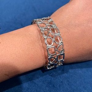 Silver tone heart and square pattern scratches bracelet